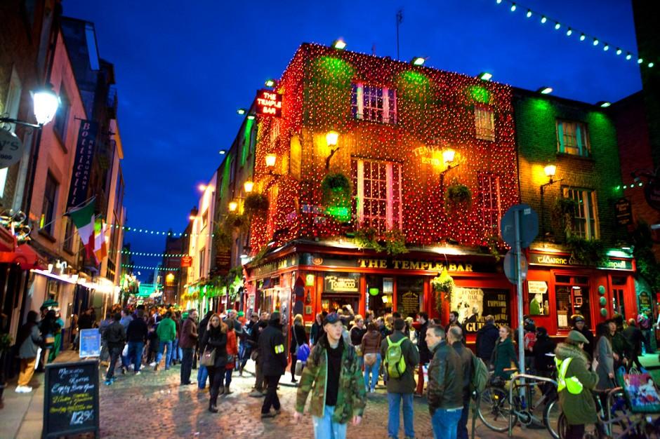 A busy evening street scene outside the Temple Bar in Dublin